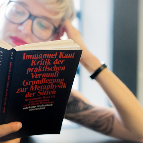 A student reading Kant's Critique of Practical Reason
